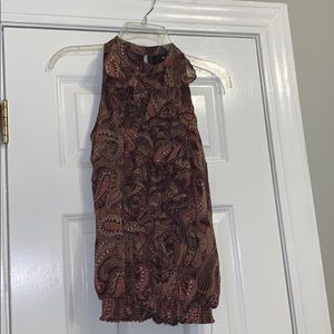 Rust sleeveless blouse